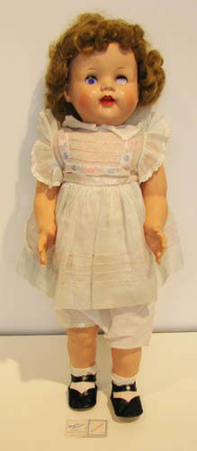 Madame Alexander "Winnie Walker" doll in original: Madame Alexander Date: 1950's Medium: Hard Plastic, Tagged, Original Clothes Dimensions: 22 inches tall Provenance: Madame Alexander