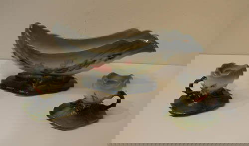 Hull Ceramic Table Garniture Set: Artist: Hull Title: Ceramic Table Garniture Set with pair of candlesticks and centerpiece decorated with blue floral relief Medium: glazed ceramic Dimensions: 6 x 14 x 5 inches (centerpiece) Signature