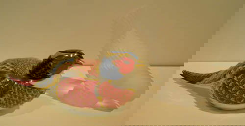 Lalique and Imariware Bird Figurines: Artist: Lalique; Royal Crown Derby Title: Imari Bird; Crystal Bird Medium: porcelain; crystal Dimensions: 6 x 2.5 x 2.5 inches; 3.75 x 2 x 5 inches Signature: marked RCD on gold seal on underside; inc