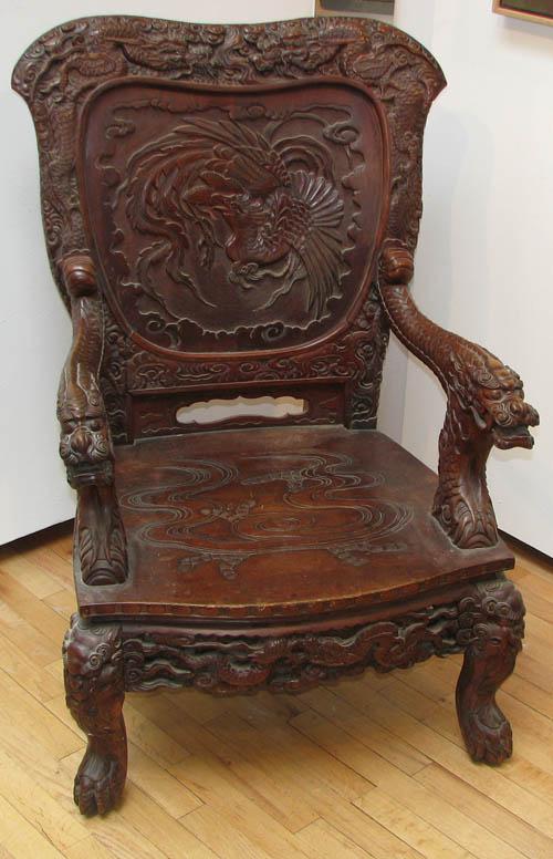 Antique Chinese & Japanese Carved Chair - 19th or : Artist: late 19th Century or Early 20th Century Chinese and Japanese Furniture Craftsman Title: Wooden Armchair with extensively carved decoration and dragon Arms and Fighting Bird on crest with exten