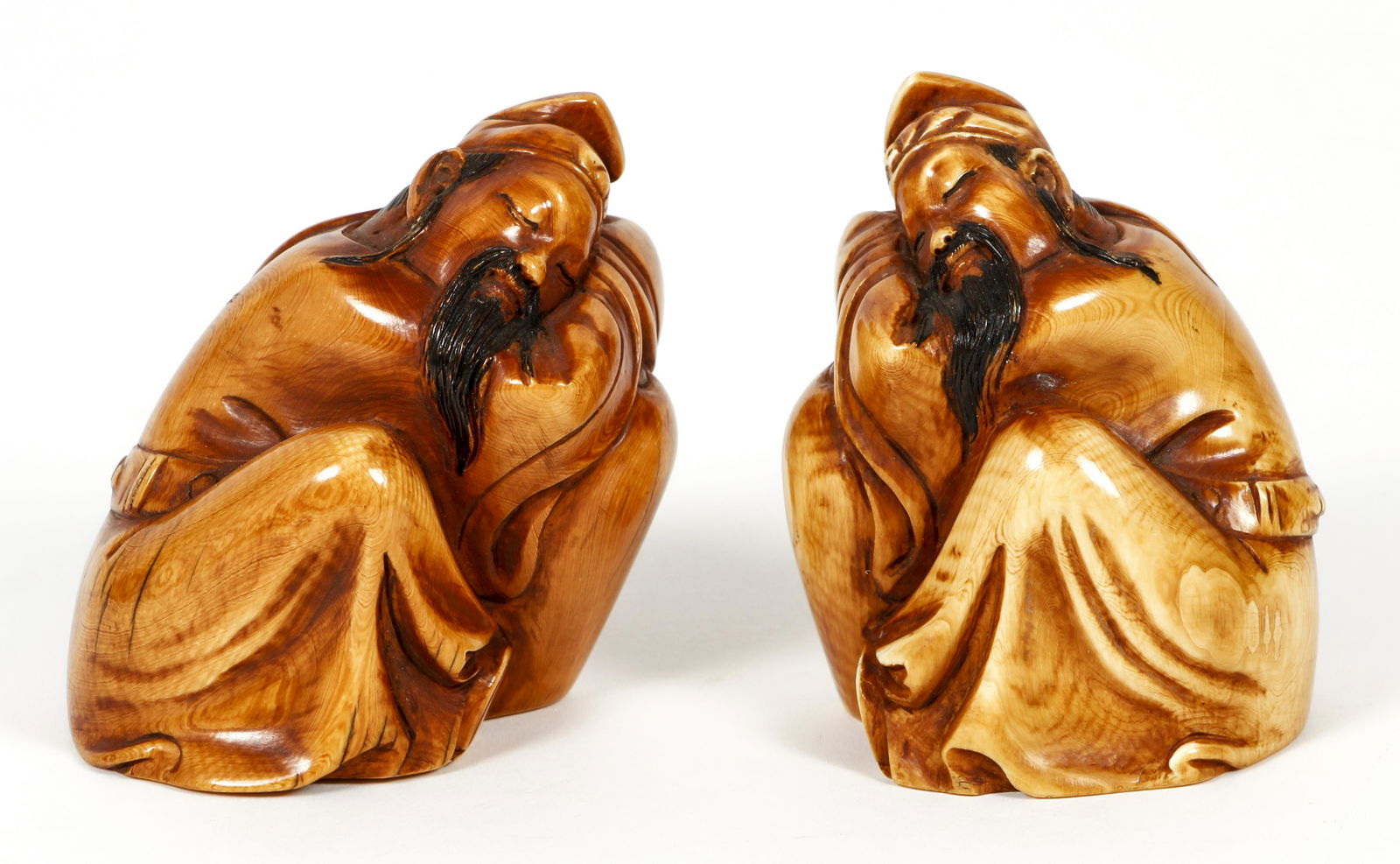 Paired of carved Sleeping Scholars: Pair Chinese Sleeping Scholars with incised signatures on underside, 2.75 x 3 x 2.25 inches, Provenance: The Estate of Bernard Olsacick .