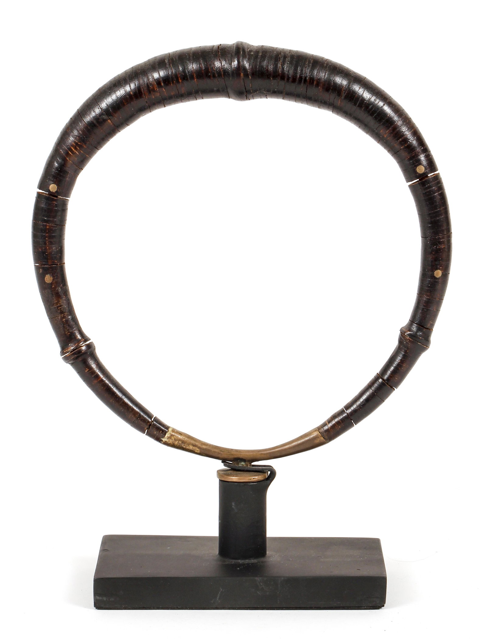 African vintage leather Choker style Necklace: Vintage Choker Necklace of wrapped leather and brass, on a fitted stand, 12 x 9 x 3.25 inches (including stand), Provenance: From the Estate of Charles Battaglini, Indiana Pa..