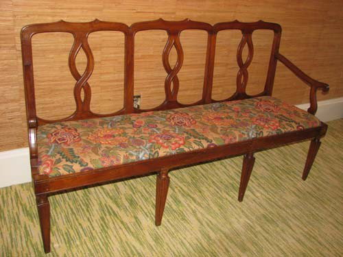 Three paneled Italian Fruitwood chair-back settee: Title: Three paneled Italian Fruitwood chair-back settee with quilted floral seat, ending on square tapered legs Medium: fruitwood Dimension: 38 x 71 x 21 inches Provenance:The Estate of Emily F. Oliv