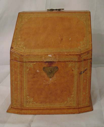 Tooled leather lift-top writing box: Title: Tooled leather lift-top writing box (dry) Medium: tooled leather Dimension: 9.5 x 11.5 x 6.2 inches Provenance:The Estate of Emily F. Oliver, Sewickley, PA