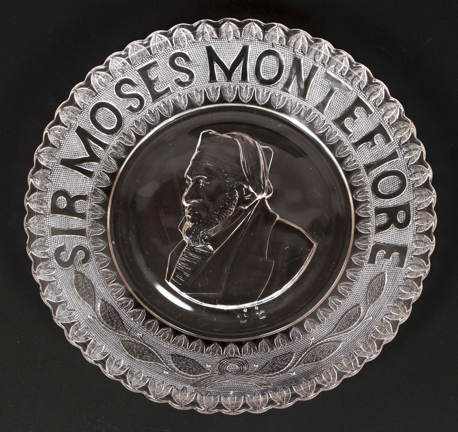 Moses Montefiore Glass Plate Portrait 1880s Judaica: British Glassmaking School, Portrait Plate of Sir Moses Montefiore, c.1880s, glass plate, British Judaica, diameter 10.5 inches.