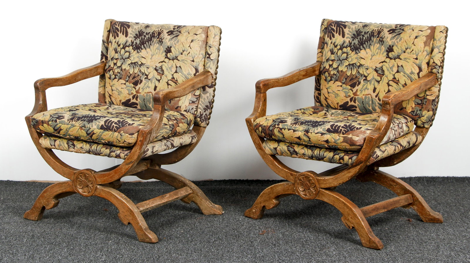 Pair 19th Century Savonarola Armchairs: Pair of 19th century Savonarola Armchairs, oak wood with attractive upholstery and carved medallions on stretcher, 35 x 27.5 x 24 inches.
