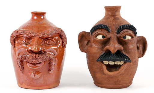 2 Face Jugs by Kim Black and Chris Woods: Woods, Chris Face Jug with Mustache, 1992, lead glazed ceramic face jug, 9 inches tall, signed, dated, and inscribed on underside, Turtle Creek Pottery with Black, Kim, Face Jug with mustache and heav