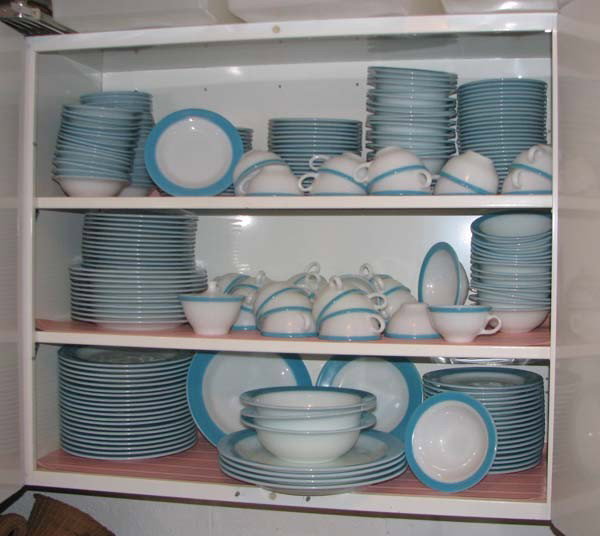 Extensive Set of Modern Pyrex Glass Dishes: Artist: Pyrex Title: Extensive Set of Pyrex Dishes including: 32 dinner plates, 4 serving platters, 3 serving bowls, 31 salad plates,31 teacups, sugar dish, 69 bread plates, 66 bowls Medium: Pyrex gla
