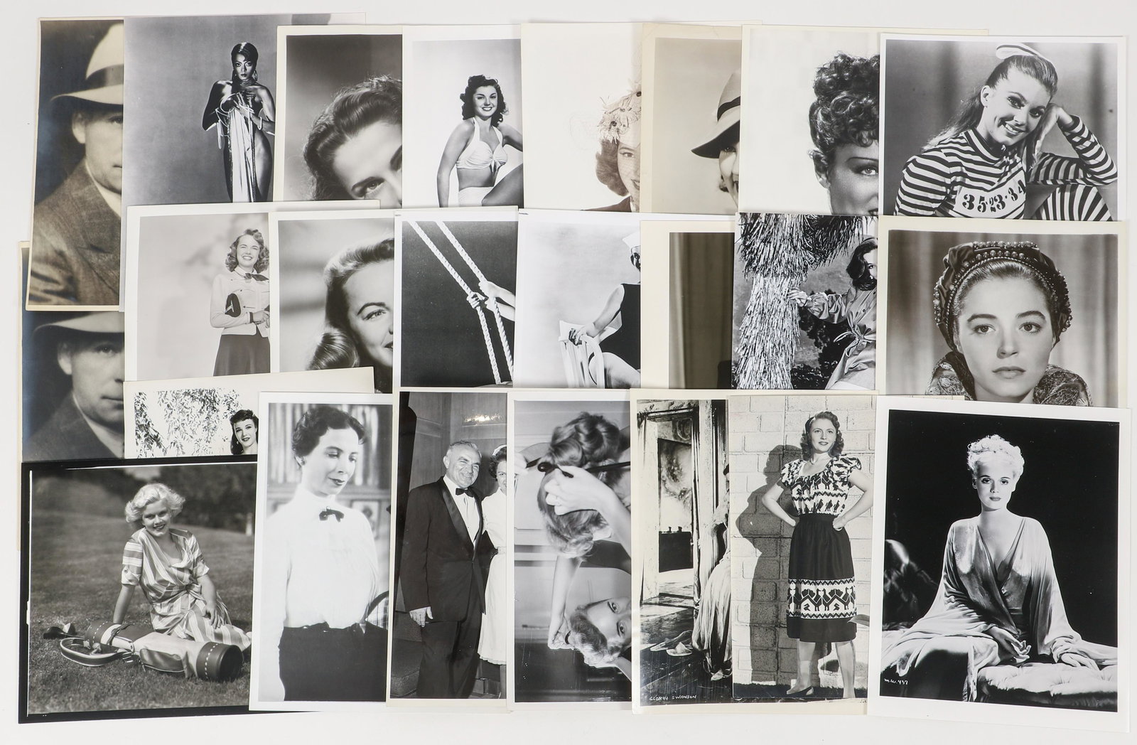 Group of 24 Hollywood Stars Portrait Photographs: Group of 24 Hollywood Stars Portrait Photographs, 3 photos marked in ink on verso, 2 photos stamped at verso, most sheet size 8 x 10 inches, all unframed. Photos of Gloria Swanson, Terry Moore, Jeff D