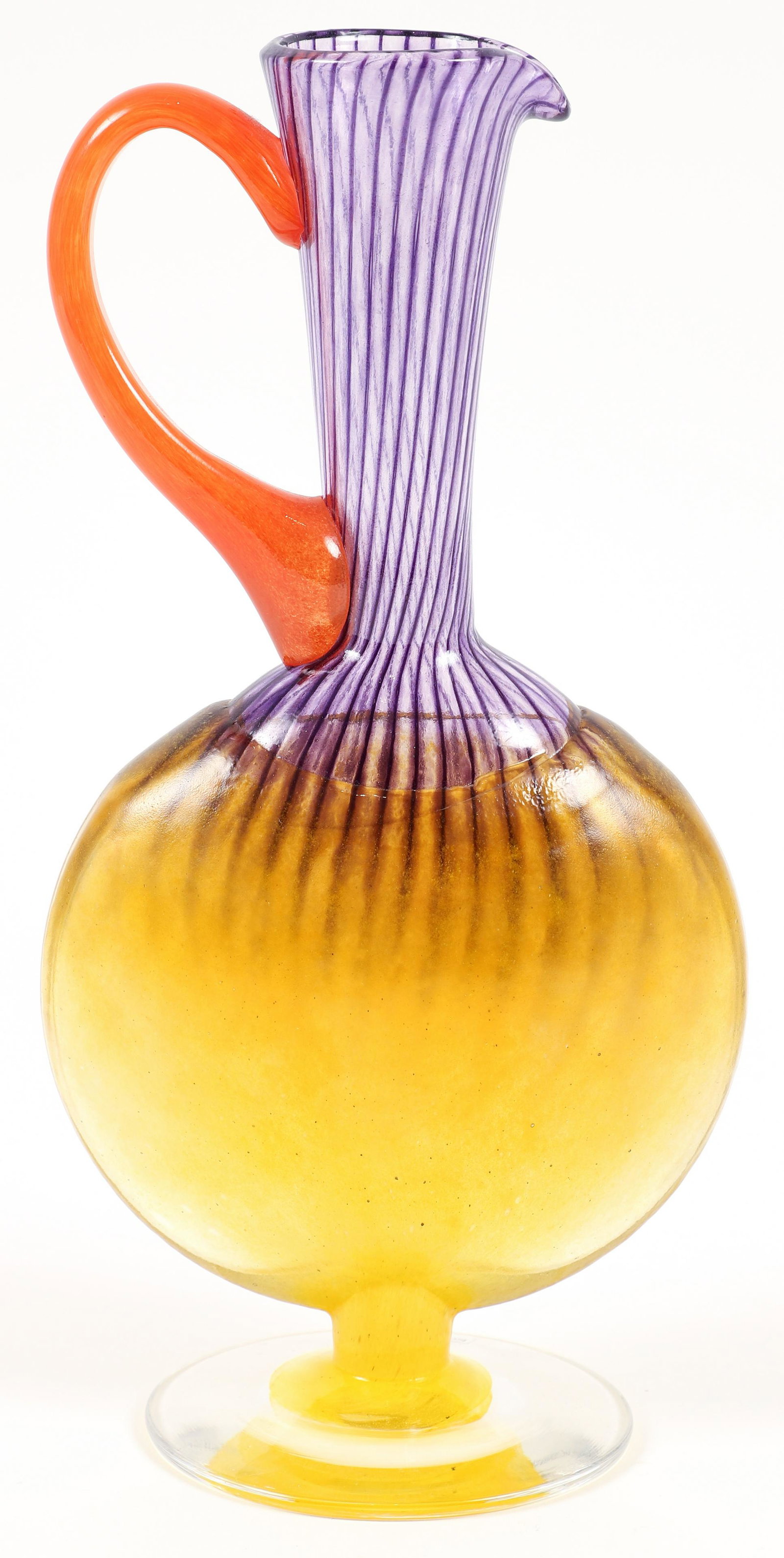 Kosta Boda Glass Pitcher by Kjell Engman: Engman, Kjell, for Kosta Boda, Art Glass Pitcher with Handle, blown lattice glass and gathered glass, 10.5 inches tall, incised KOSTA BODA KJELL ENGMAN 89065 on underside and original sticker.