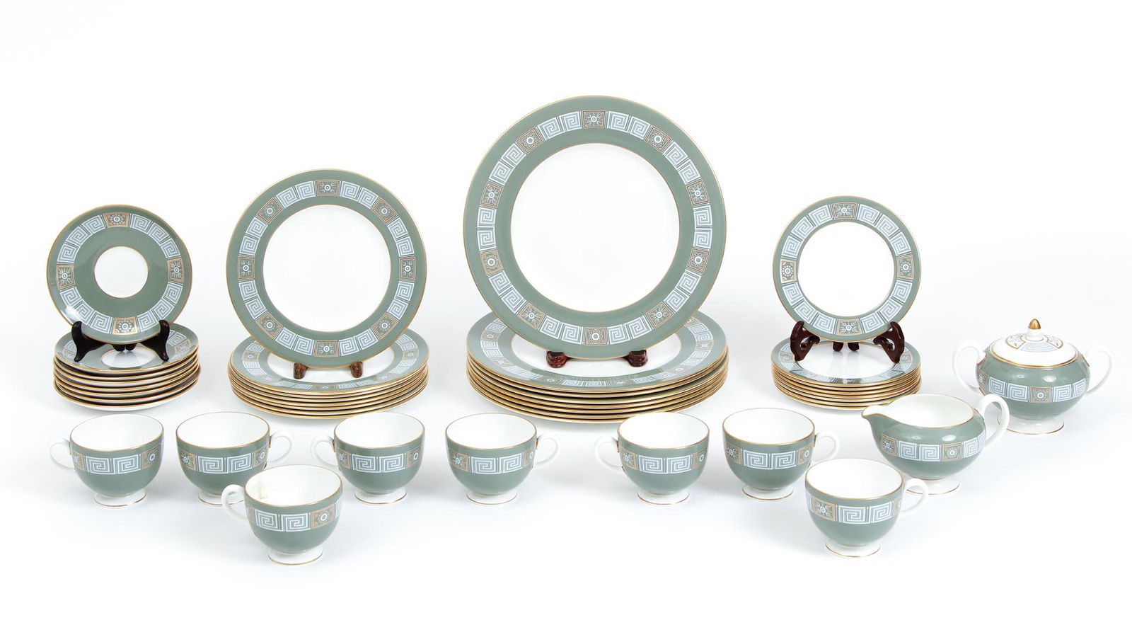 42 Pc Wedgwood Asia Green Bone China Dish Set: 42 piece Wedgwood bone China dish set in Asia Green style: 8 dinner plates, 8 lunch plates, 8 dessert plates, 8 tea cups, 8 saucers, 1 sugar bowl, 1 creamer. Dinner plate 10.75 inches in diameter. Mad