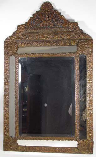 Cast metal Victorian Mirror: Title: Cast Metal Mirror with foliate and flower relief decoration Medium: cast metal Dimensions: 41 x 25 x 2.5 inches Provenance: The Estate of Sara Davidson, Pittsburgh, Pa.