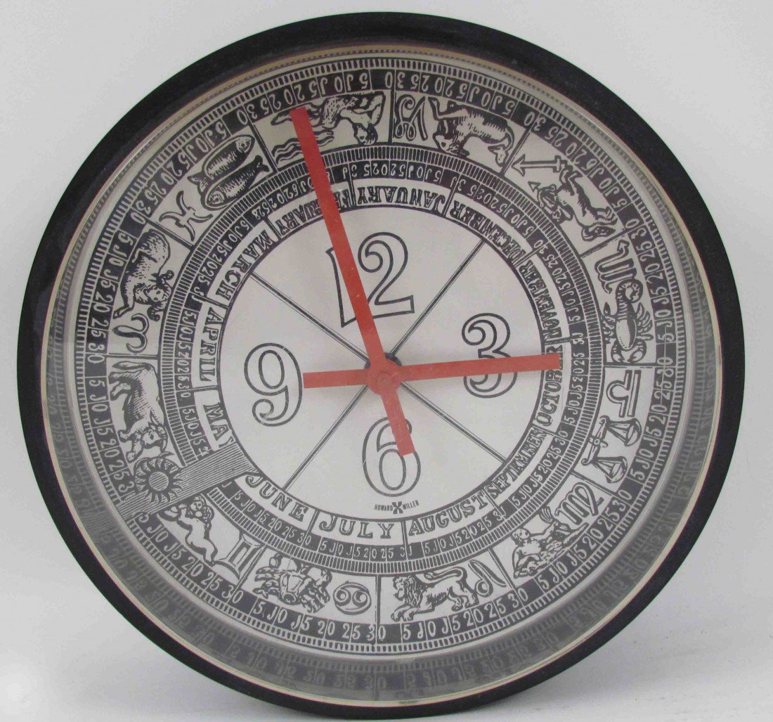 Howard Miller Zodiac Wall Clock: Title: Zodiac Wall Clock Model number 922 Medium: plastic and clock works Dimensions: 9.5 x 9.5 x 3.25 inches Signature: label attached to reverse Provenance: Marilyn Donnelly Collection