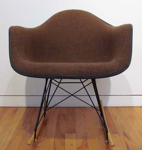 Eames RAR Rocker with Upholstery: Artist: Eames, Charles and Ray for Herman Miller Title: Eames RAR Rocker with Brown Tweed Upholstery Medium: fiberglass with upholstery Dimensions: 27 x 25 x 25 inches Signature: Herman Miller stamp o