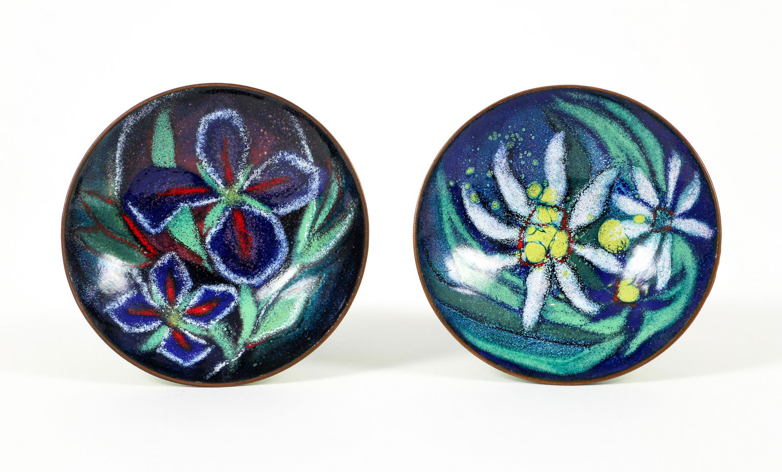 Pair of Virgil Cantini Floral Enamel Bowls: Cantini, Virgil (American/Western PA, 1919-2009), Pair of Ashtrays with Floral Motifs, 1970s, enamel on metal, both with artist's incised signature to base, diameter 4.25 inches.