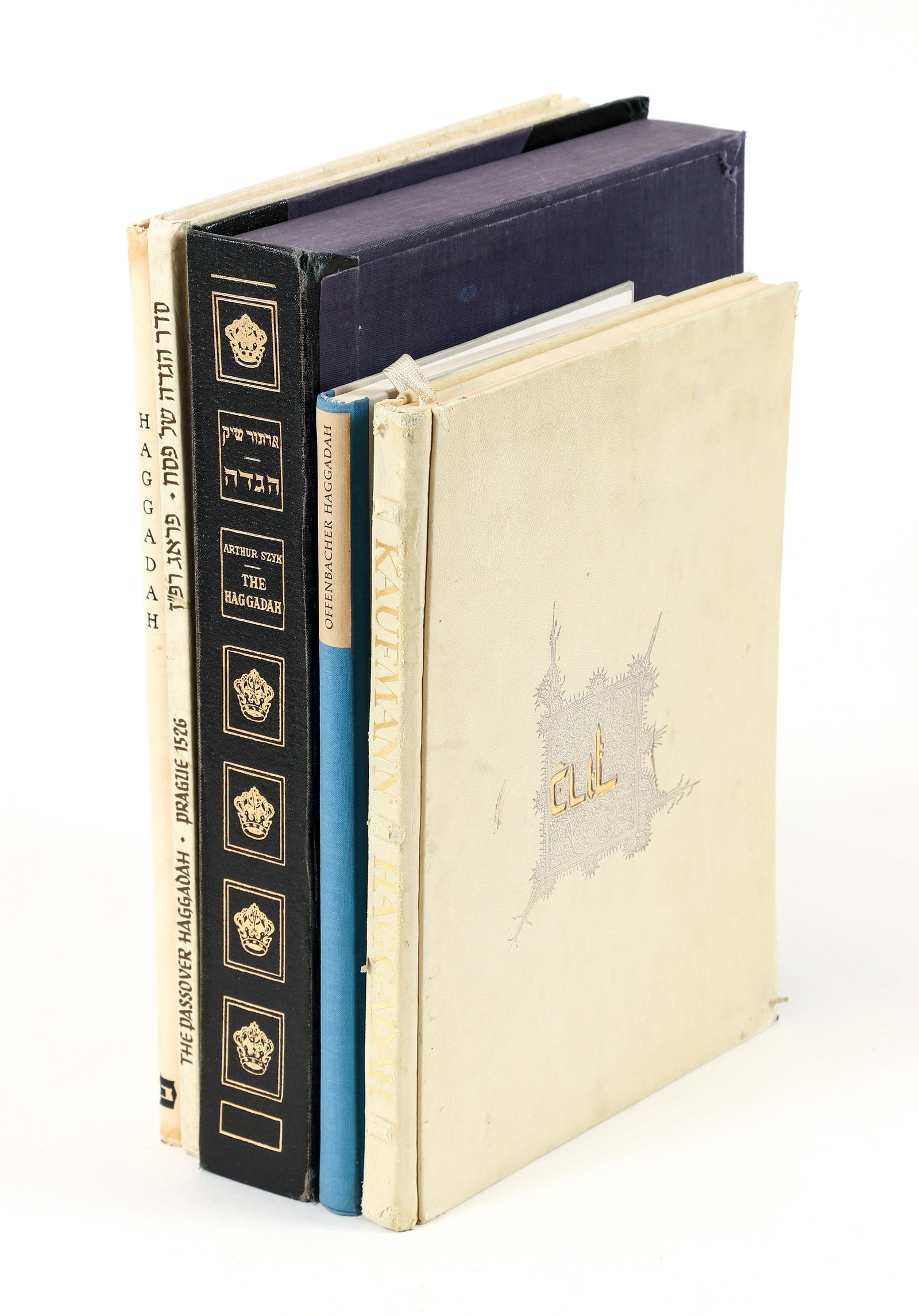 Lot of 5 Highly Illustrated Haggadot Passover Judaica: Lot of 5 Highly Illustrated Haggadot for Passover, includes the Arthur Szyk Haggadah, 1962, bound in blue velvet and housed in slipcase; 1957 facsimile of the Kaufmann Haggadah; 1960 facsimile of the