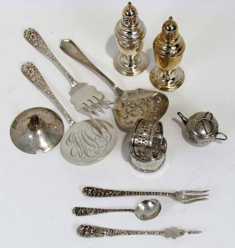 Assortment of sterling silver table ware: Title: Assortment of sterling silver table ware Medium: sterling Dimensions: 14.85 ozt Description: 5 Stieff serving pieces in the Balto Rose pattern, 2 napkin rings, 1 set salt and pepper shakers, Sa