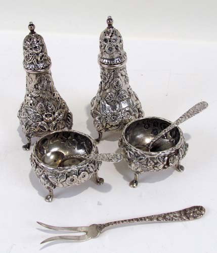 Sterling Kirk and son salt cellars and pepper cast: Title: Sterling Kirk and son salt cellars and pepper casters Medium: Sterling Dimensions: 8.844 ozt Description: 2 sterling pepper casters with open salts with matching spoons and pickle fork