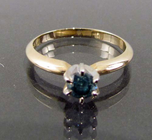 14kt gold ring with blue teal diamond: Title: 14kt two tone gold 6-prong tiffany style engagement ring with round cut .35ct medium blue teal enhanced diamond Dimensions: .35ct diamond