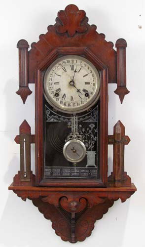 Waterbury Clock Company Mahogany wall clock: Artist: Waterbury Eight-Day Strike Union wall clock Title: Waterbury Eight-Day strike Dimensions: 27 x 13.25 x 3.75 inches