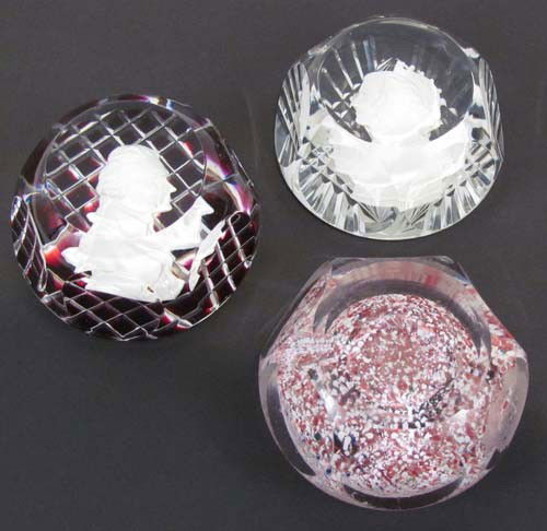 Pair of Baccarat paperweights with another Paperwe: Title: Vintage 1953 Baccarat paperweights; Coronation of Queen Elizabeth II and Thomas Jefferson and crystal paperweight Date: 1953 Dimensions: 1.5 x 2.5 x 2.5 Signature: Baccarat
