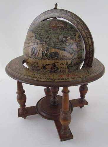 replica of antique globe with Zodiac motif on stan: Title: Replica globe with Latin names and wooden stand with zodiac signs Medium: paper and wood Dimensions: 16.5 x 12 x 12 inches