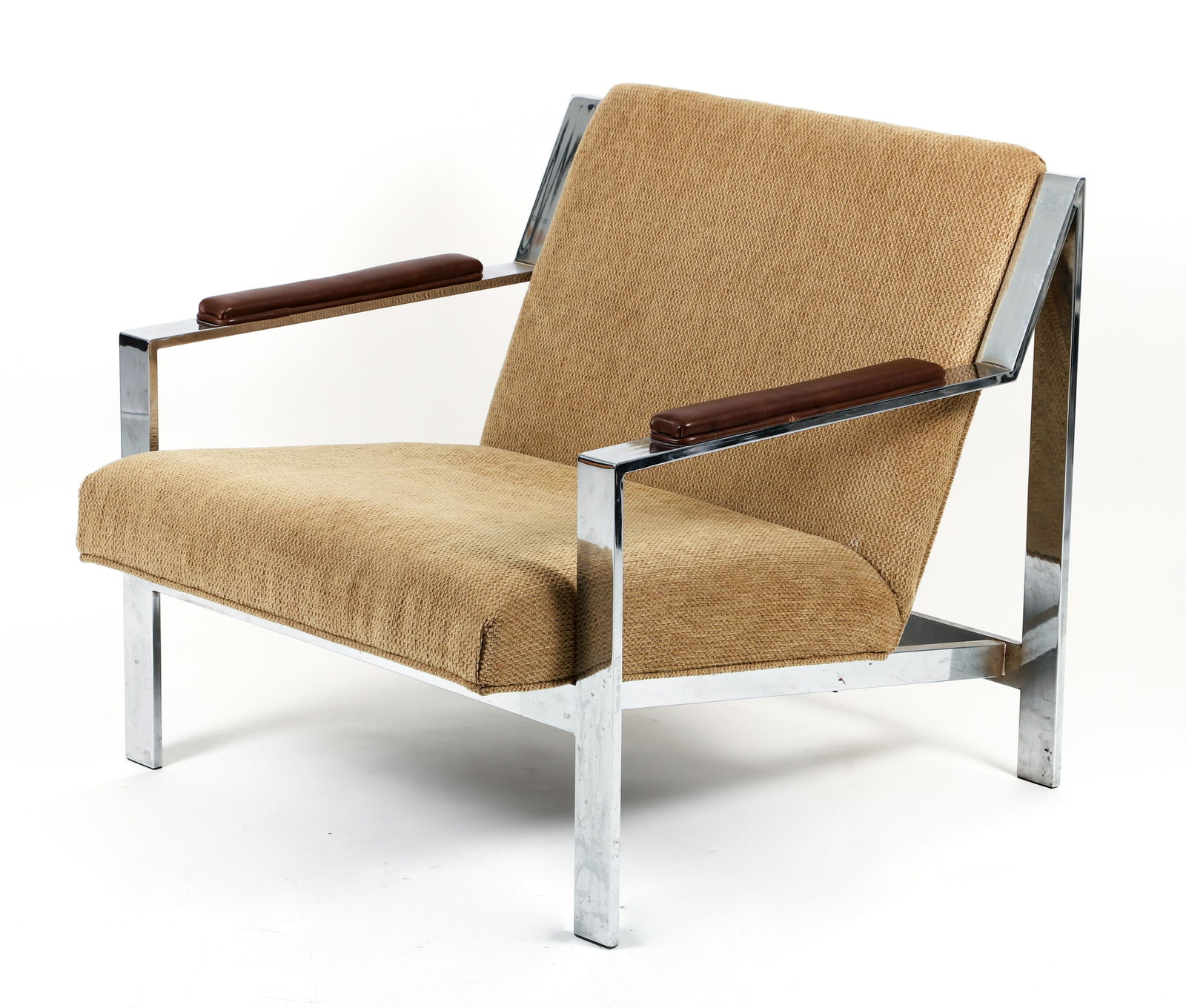 Cy Mann Upholstered Chrome MCM Lounge Chair: Mann, Cy, Lounge Chair, c.1970s, chrome frame, oatmeal upholstery and new faux-leather armrests, 27.5 x 29.25 x 31.5 inches, seat height 15 inches, no apparent markings, this design is often referred