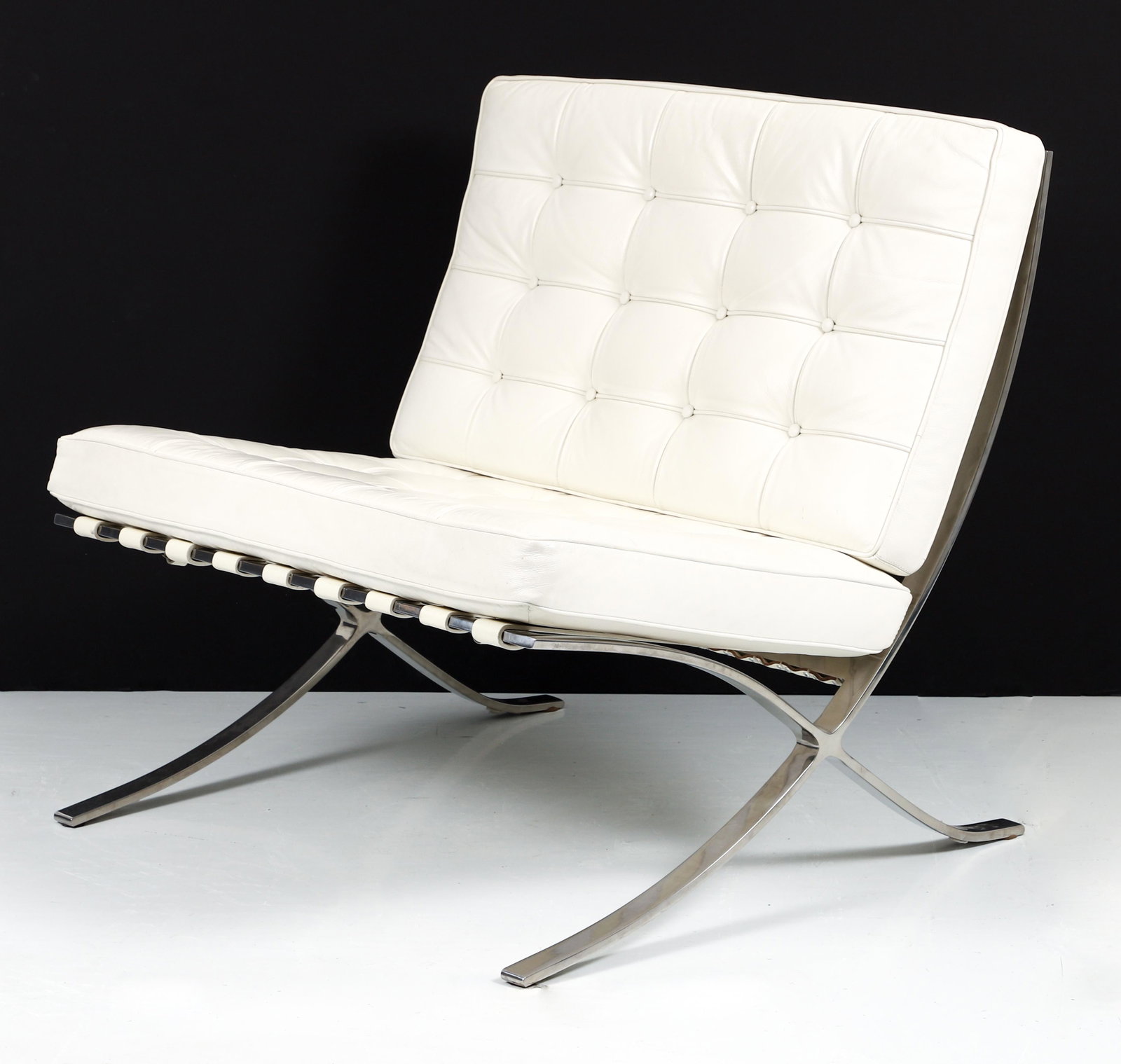 Van der Rohe style Barcelona chair White Leather: Mies Van der Rohe style Exposition Chair by Alphaville, manufactured in 2008, a modern copy after the original Barcelona design, full white Italian leather on stainless steel frame, 29 x 29.5 x 28 inc