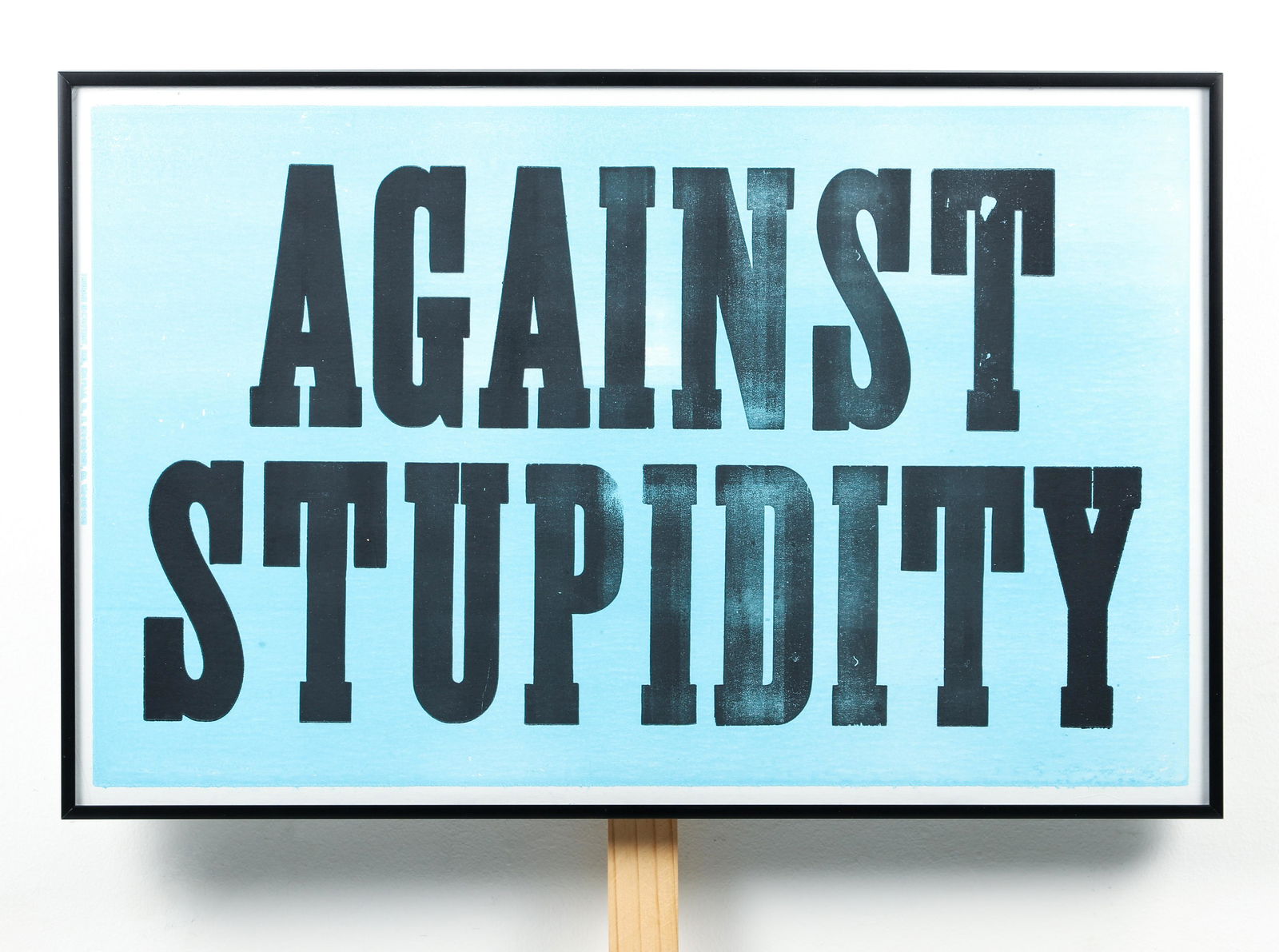 Daniel Joseph Martinez 2016 multiple Against Stupidity: Martinez, Daniel Joseph (American, born 1957), Against Stupidity, 2016, color woodblock on screen print on clay coated cardboard, 14 x 22 inches then framed on a wood signpost that is 49.5 inches tall