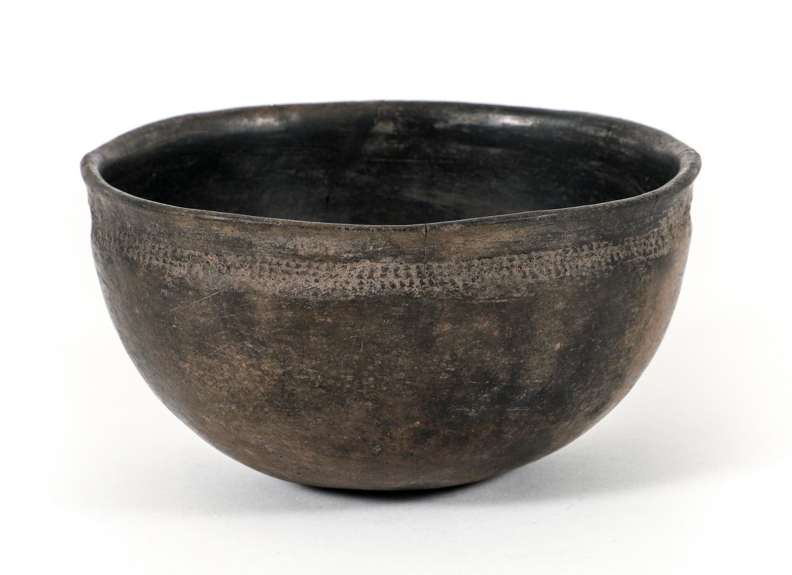 Anasazi Tularosa Cooking Bowl: Anasazi Tularosa Cooking Bowl circa 1050-1100 with impressed corrugated lower rim, 3.75 x 6.5 inches, Provenance: purchased in Reserve NM in 1988 from dealers Jan and Leon Porter found near Apache Cre