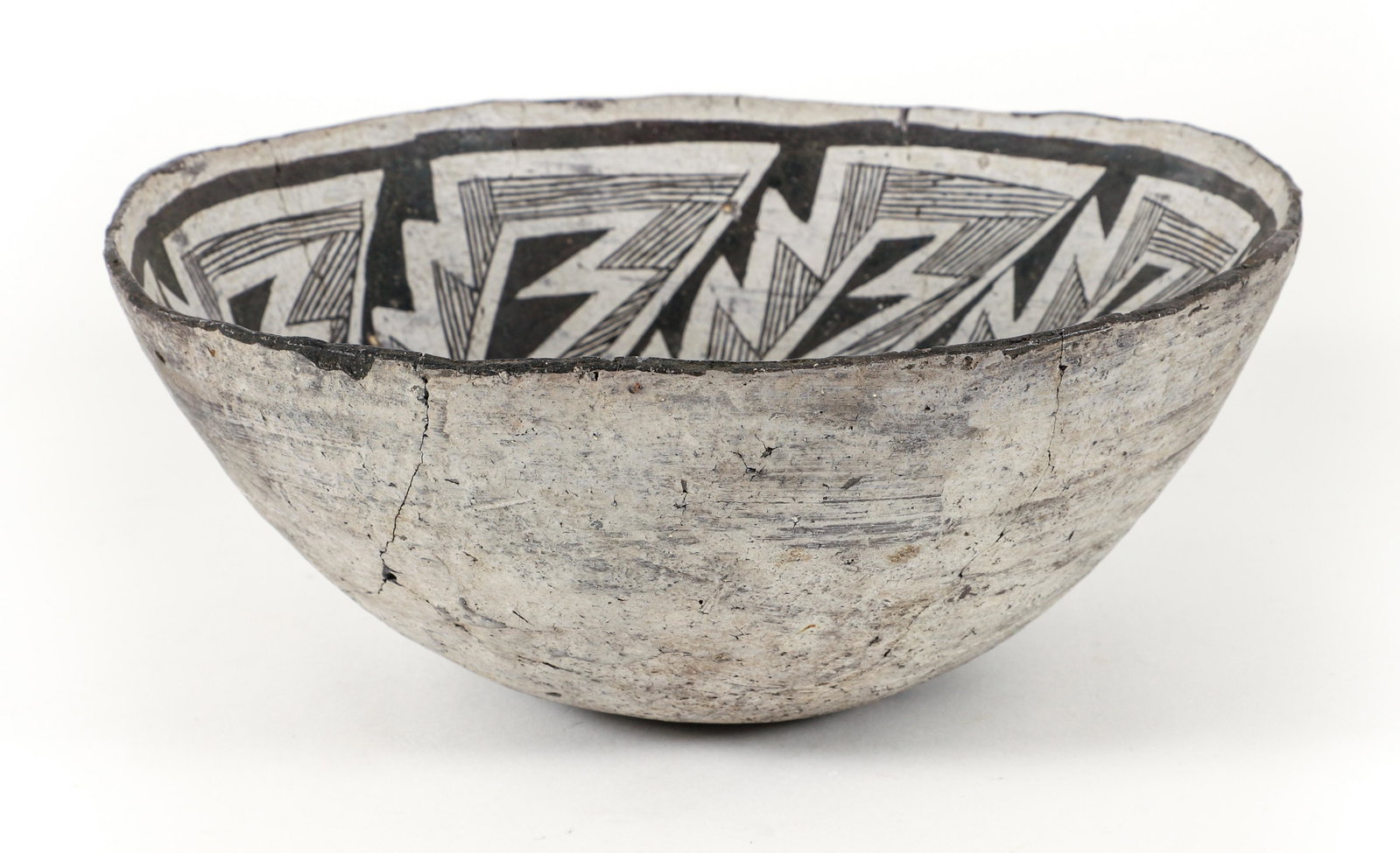 Anasazi Tularosa Bowl circa 1025: Late Reserve Anasazi Tularosa Bowl circa 1025 with extensive and fine interior decoration of lightning and eye design, 4 x 9.5 inches, Provenance: purchased in Reserve NM in 1988 from dealers Jan and 