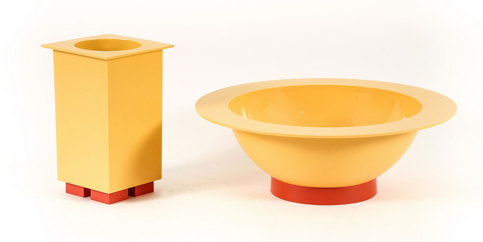 Michael Graves Alessi Salad Bowl and Wine Bucket: Graves, Michael, for Alessi, Euclid Salad Bowl and Wine Bucket, mid 1990s, yellow and orange plastic, both marked to underside, bowl height 5.5 inches and diameter 15.25 inches, wine bucket 9 inches t