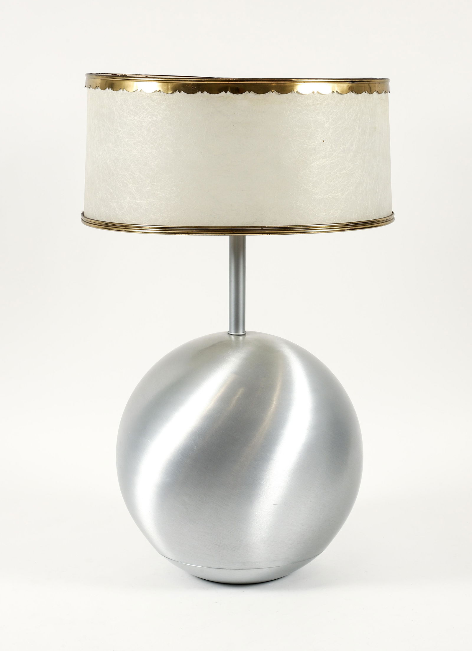 Attr. to Russel Wright Spun Aluminum Sphere Lamp: Attributed to Russel Wright for Raymor spun aluminum sphere form table lamp with a milk glass torchiere shade, mid 20th century, unmarked. 29.5 x 14.5 inches, including shade.