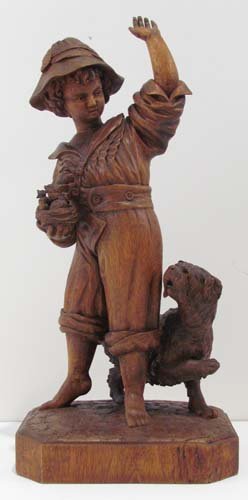 Johann Huggler "Boy with Bird's Nest" Black Forest : Artist: Huggler, Johann (Swiss 1834-1913) Title: Boy holding Baby Birds in a Nest while warding off an Interested Dog Medium: wood carved in relief Dimensions: 18 inches Description: beautifully carve