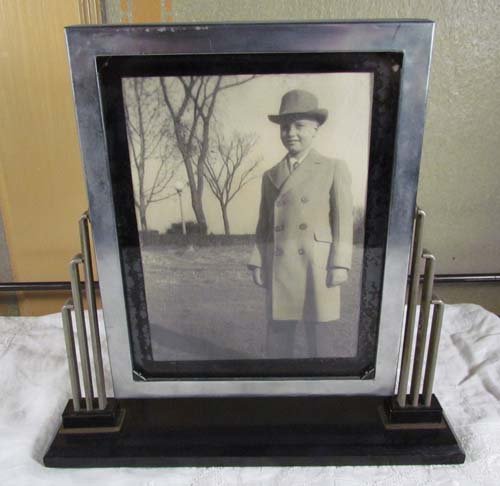 Art deco metal picture frame: Title: Art deco metal picture frame Medium: metal from The Estate of Joe Trees Dimensions: 12 x 12 x 3 inches
