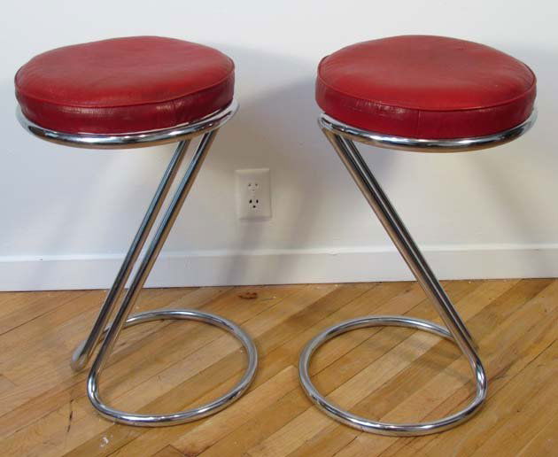 Pair "Z" stools by Gilbert Rohde for Troy Sunshade: Artist: Gilbert Rohde Title: Red leather and chrome Medium: chrome and leather Dimensions: 24.5 inches tall