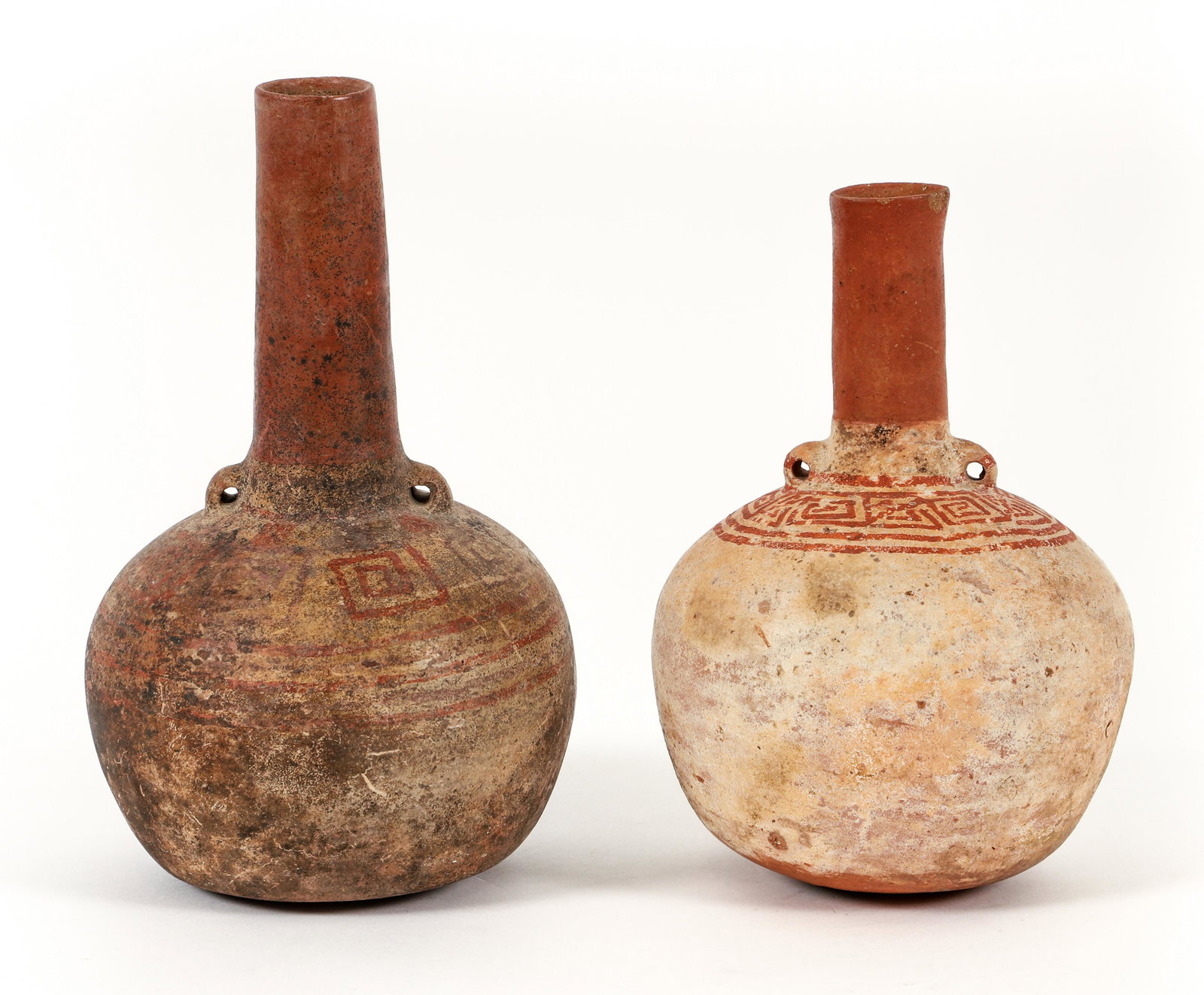 Two Vicus Culture Bottle shaped Pots: Two Vicus Culture Bottle shaped Pots with geometric decoration, glazed ceramic pottery, The Vicus culture (Early Intermediate Period c.200BCE-800CE) centered in the Piura region of northwest Peru. It 