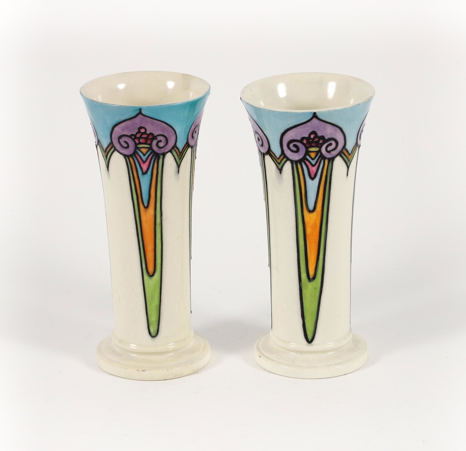 Pair of Minton Secessionist Ware Vases : Pair of Minton Secessionist Ware vases. One tube lined decoration in stylized green ivy pattern over umber ground, 1900-1915, stamped No. 46, 6.25 x 3.25 inches. One tube lined decoration in stylized 