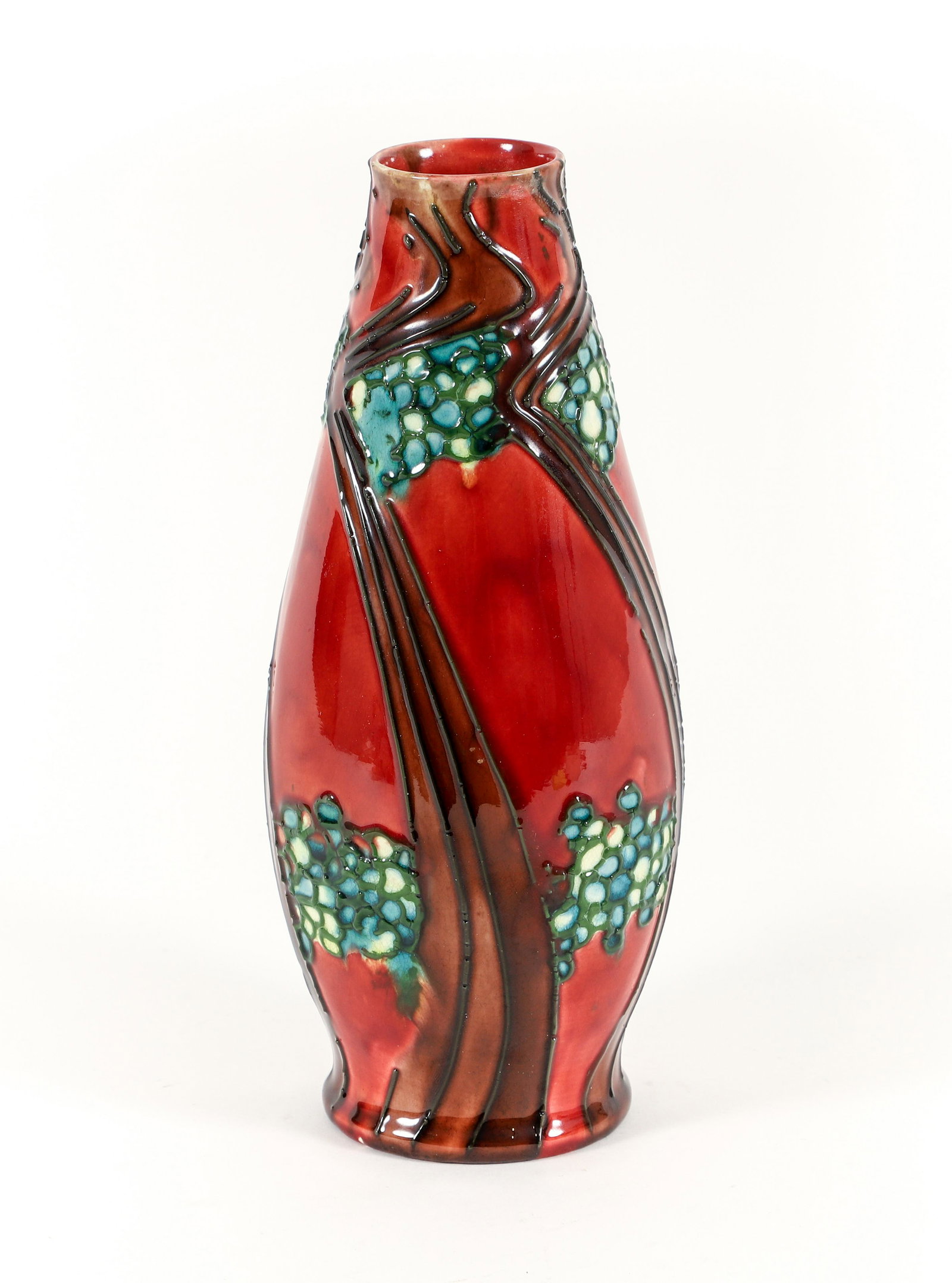 Red Ground Minton Secessionist Ware Vase : A Minton Secessionist Ware vase, tube lined decoration in stylized abstract wave and circular pattern over red ground, 1900-1915, stamped Minton No.1, Impressed Minton, 3337. 9 x 3.5 inches.
