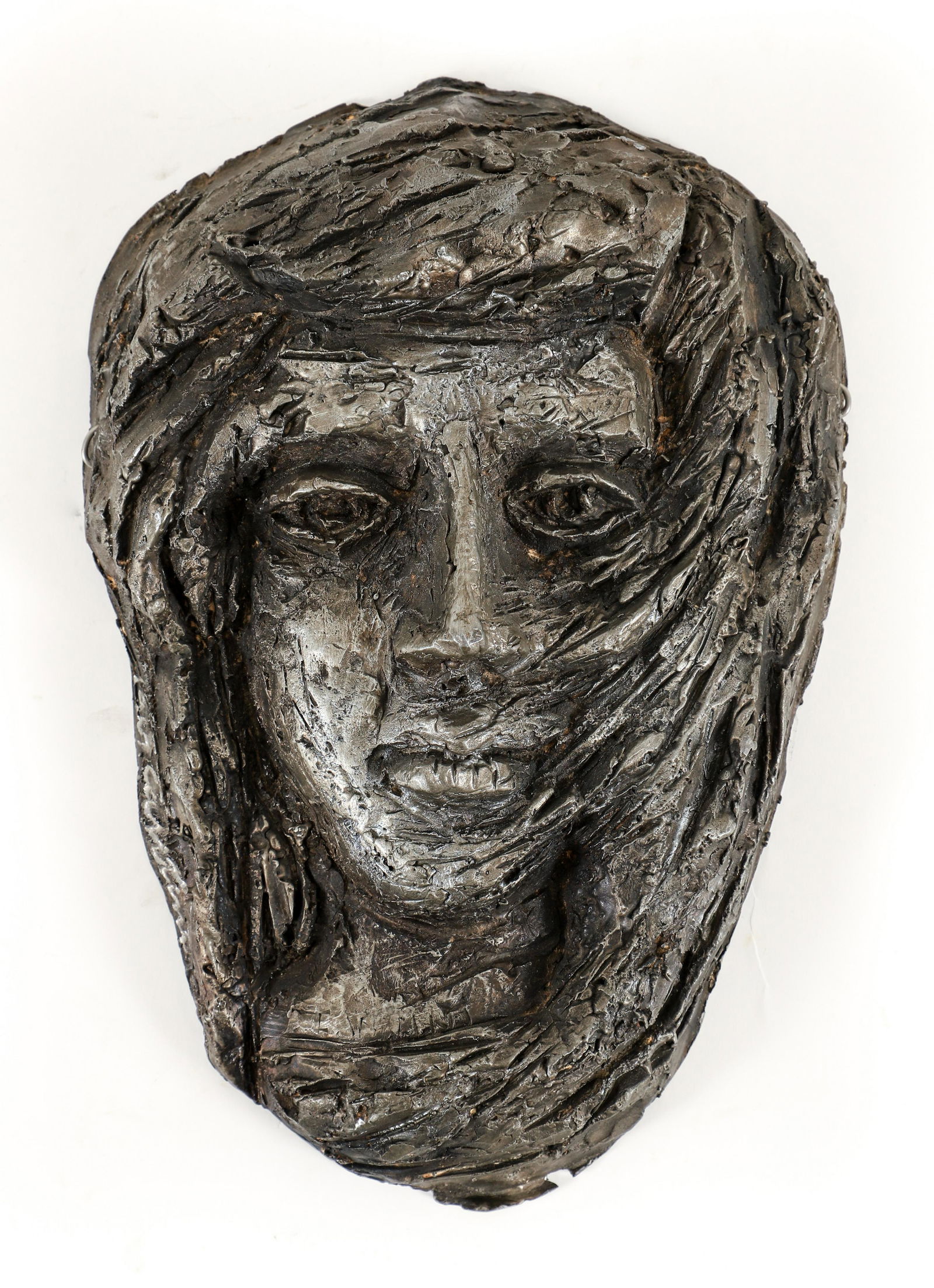 Virgil Cantini Portrait Wall Sculpture 1957: Cantini, Virgil David (American/Western PA, 1919-2009) Portrait, 1957, metal wall sculpture, incised signature and date verso. 2.75 x 11 x 7.5 inches.