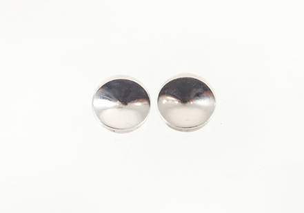 Georg Jensen Sterling Concave Disk Earrings: Sterling concave disk earrings. Modernist design by Nanna Ditzel for Georg Jensen. These sterling earrings are deceptively simple—the concave shape alters the look of the earrings as the wearer