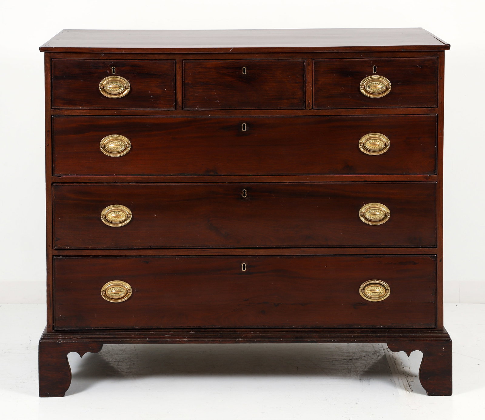 4 drawer Chippendale Mahogany Chest of Drawers: 4 Drawer Chippendale Chest of Drawers circa 1790, with divided top drawer and tall bracket feet and dust boards lining interior, replaced brasses, 41.75 inches tall x 21 inches deep x 49.5 inches wide