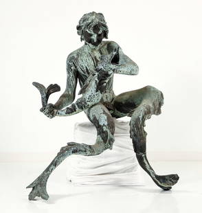 Italian Dual-Tailed Bronze Merman Fountain Sculpture: Monumental patinated bronze dual-tailed merman fountain sculpture, Italian School, likely 17th/18th century. The seated merman gazes down at an open mouthed fish in his hands, each of his tails outstr