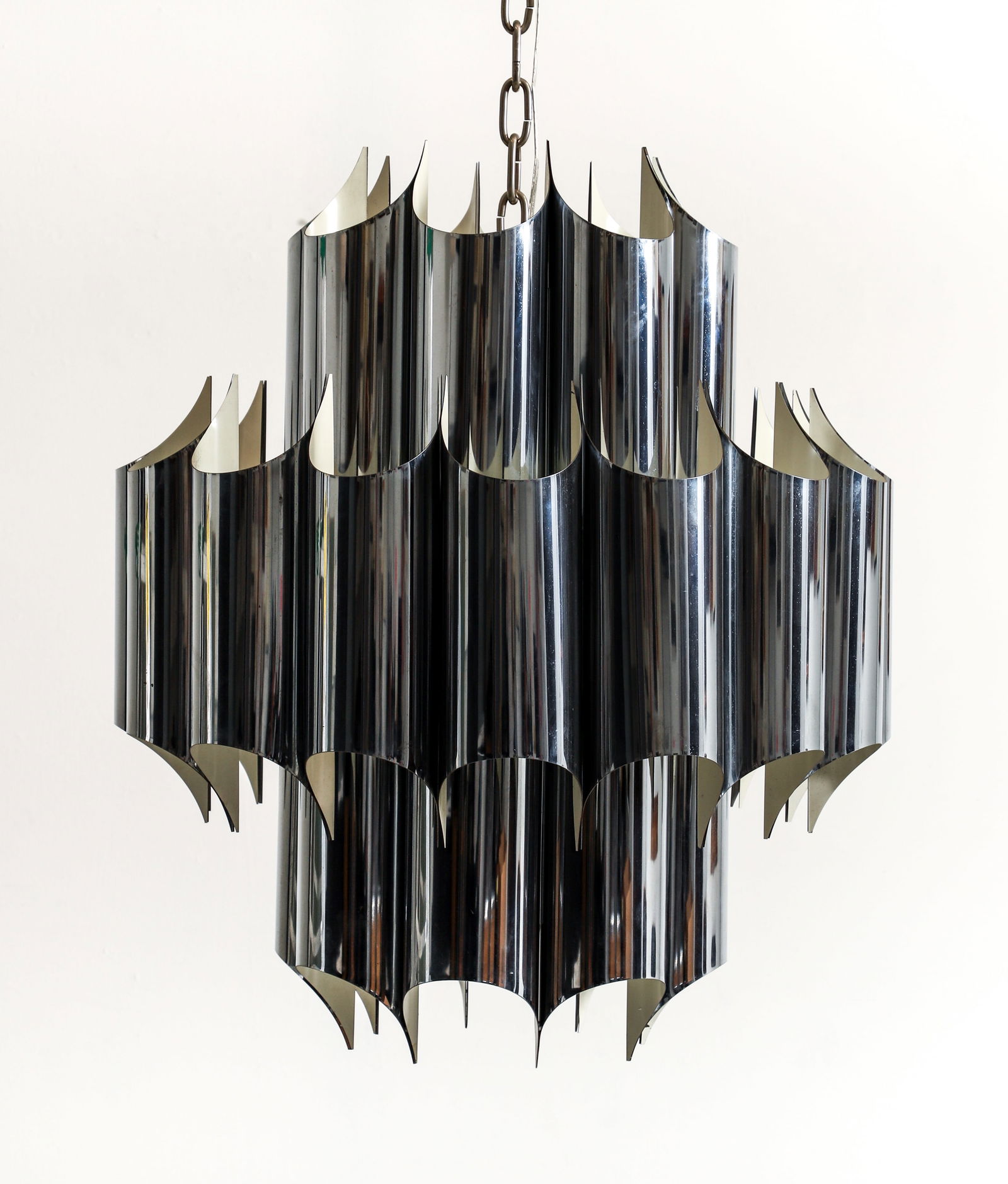 Robert Sonneman Cathedral Chandelier 1970s: Robert Sonneman chrome and enameled metal Cathedral chandelier, 1970s. Folded chrome tubular design with four sockets. Sonneman paper label on interior. 28.5 x 26 inches.
