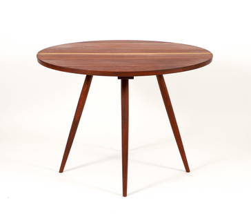 George Nakashima Round Dining Table: Nakashima, George (American, 1905-1990), Round Dining Table, mid-1960s or earlier, walnut with turned legs, 28.5 inches tall, diameter 39.75 inches, unmarked, single butterfly joint visible on the und