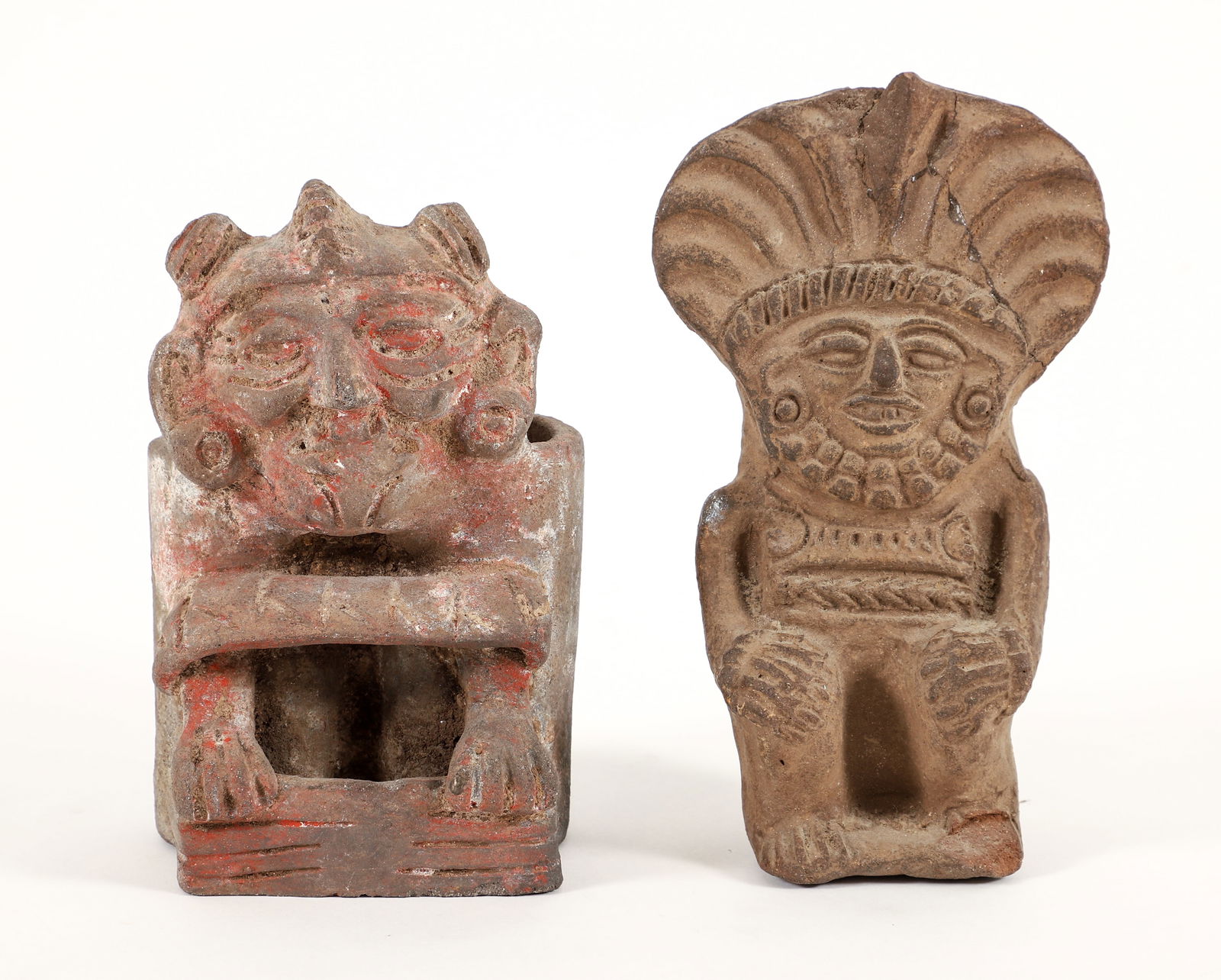2 Seated Pre-Aztec Cargadores: Pre-Aztec (before 13th century) from the Tlaxcala and Puebla area of central Mexico, 2 Seated Cargadores, clay pottery, largest H:6.5 inches x W:3.75 inches and similar size.