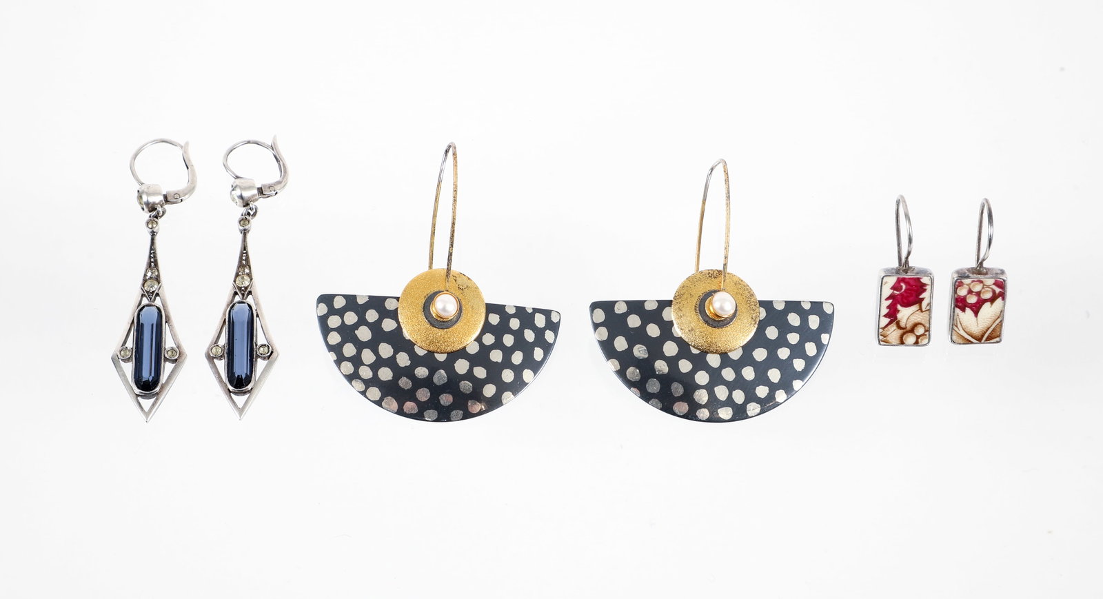 3 Pair of Artisan Earrings: 3 pair of artisan earrings. Includes a pair of silver rectangular bezel mountings set with porcelain floral pieces. Measures 1/2" in length, 3/8" wide, with 1/2" wire. Marked "JL 925". Approx. 3.8 gra