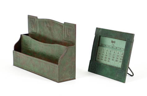 Tiffany Bronze Desk Letter Rack and Calendar Frame: Two Modeled pattern desk set pieces by Tiffany. Including: Letter rack, faux verdigris patination, stamped Tiffany Studios New York, No. 1124 at underside, approximately 6 x 9.5 x 2.25 inches; Calenda