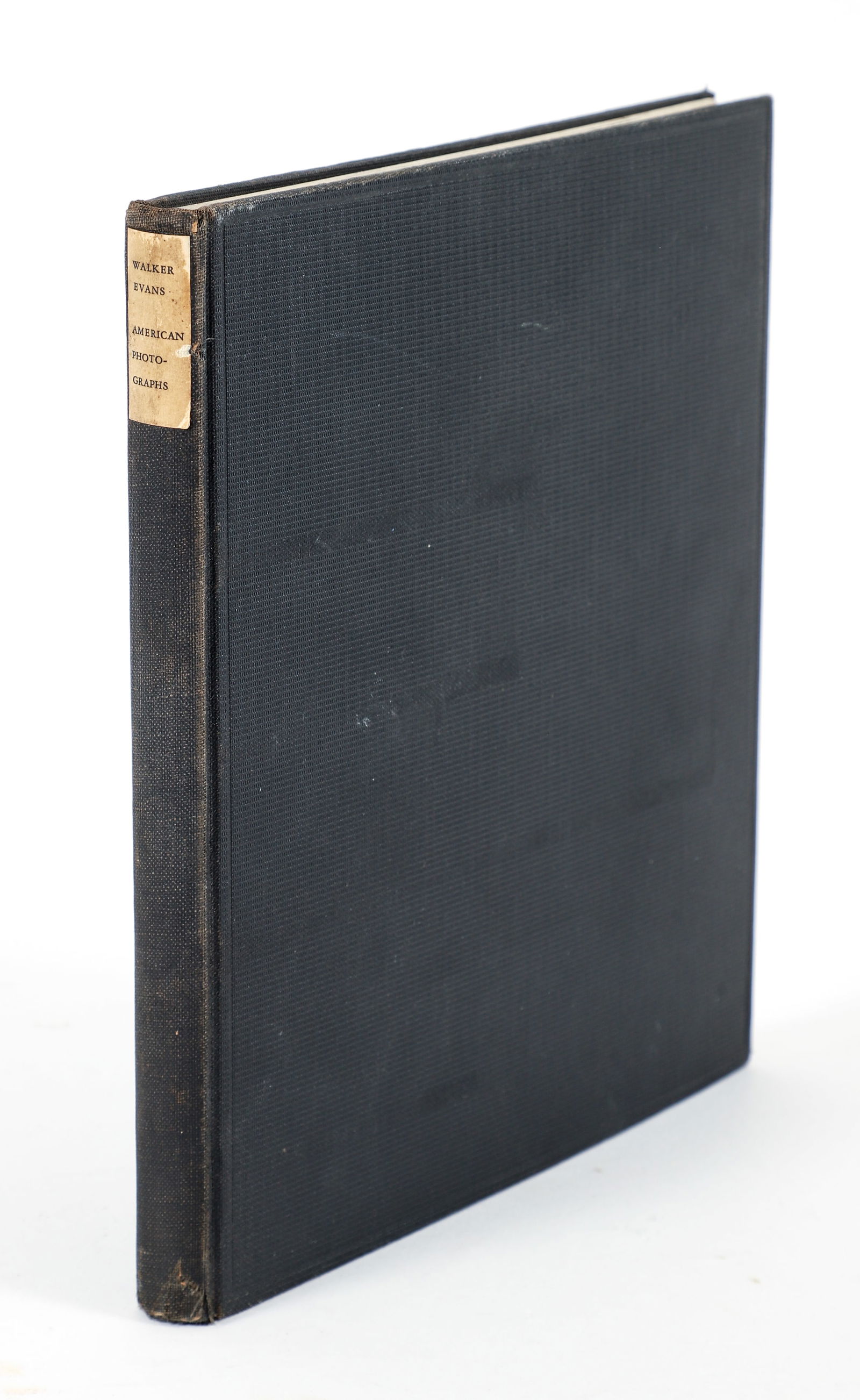 Walker Evans American Photographs 1938 MoMA Catalog: Evans, Walker, American Photographs, with an essay by Lincoln Kirstein, 1938, one of 5000 copies published by the Museum of Modern Art and printed at the Spiral Press, hardcover, spine label, 87 black