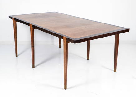 Edward Wormley for Dunbar 6 Leg Dining Room Table: Edward Wormley for Dunbar 6 Leg Dining Room Table. Rectangular walnut table with contrasting finish border, 6 tapered legs terminating in brass caps. Includes two leaves and folding dining table pads.